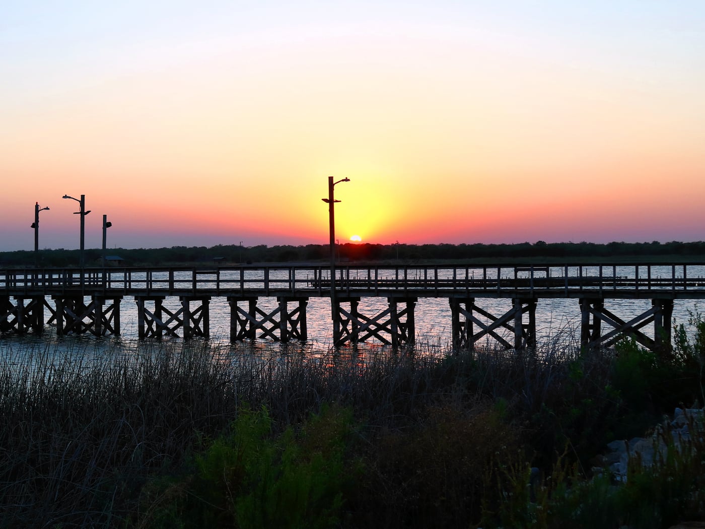 Sundown over the water by Horseshoe RV Park, Ranger — representative imagery, not a specific Horseshoe RV Park photo